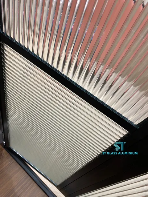 Rib Glass Bifold — Bifold Door by ST Glass Aluminium thumbnail 4
