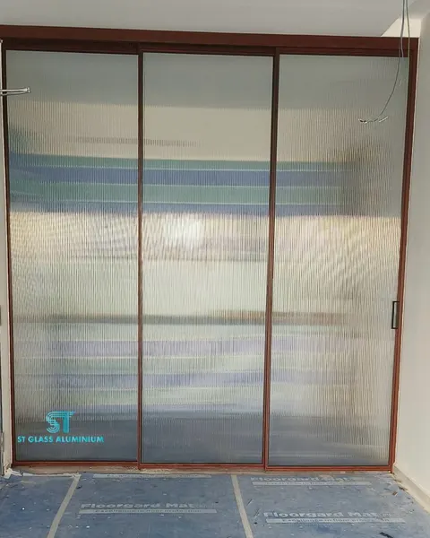 Slim Hanging Sliding Door — Trackless Sliding Door by ST Glass Aluminium thumbnail 1