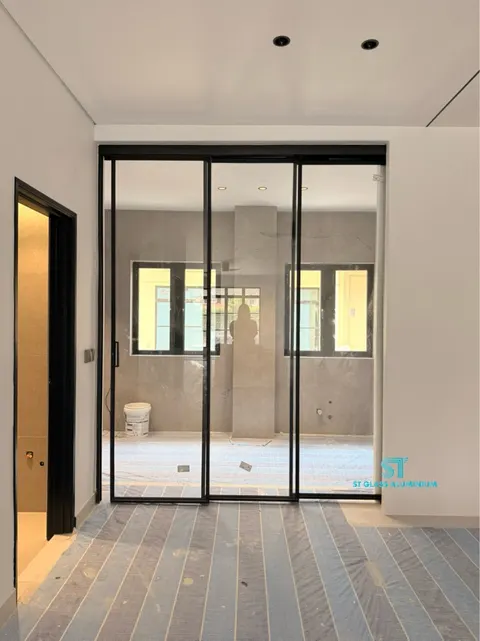 Slim Hanging Sliding Door — Trackless Sliding Door by ST Glass Aluminium thumbnail 4
