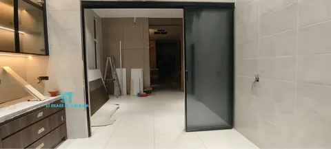 Slim Hanging Sliding Door — Trackless Sliding Door by ST Glass Aluminium thumbnail 3