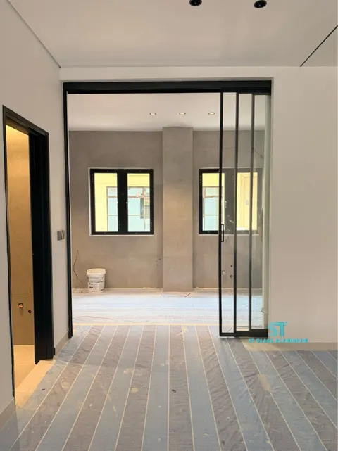 Slim Hanging Sliding Door — Trackless Sliding Door by ST Glass Aluminium thumbnail 6