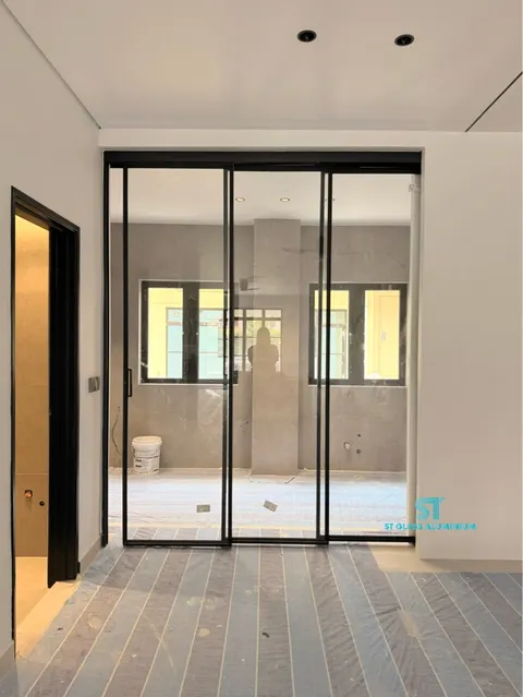 Slim Hanging Sliding Door — Trackless Sliding Door by ST Glass Aluminium thumbnail 3