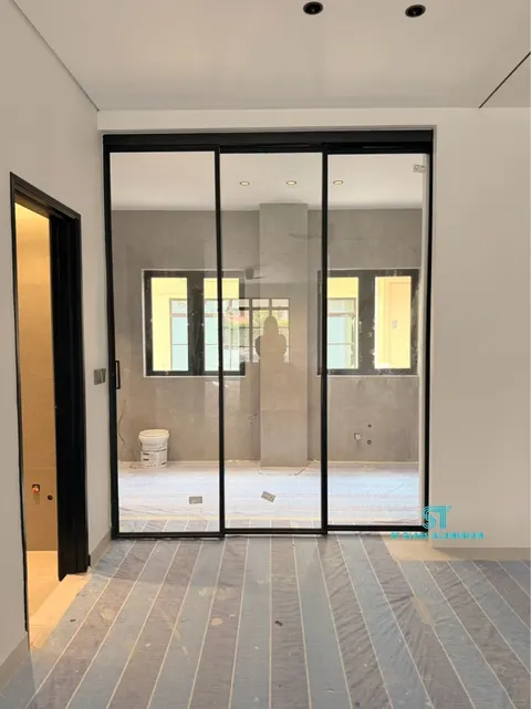 Slim Hanging Sliding Door — Trackless Sliding Door by ST Glass Aluminium thumbnail 5