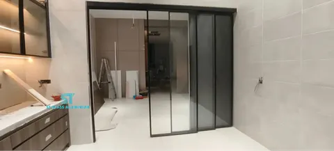 Slim Hanging Sliding Door — Trackless Sliding Door by ST Glass Aluminium thumbnail 2