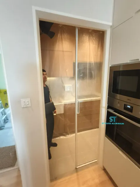 Slim Hanging Sliding Door — Trackless Sliding Door by ST Glass Aluminium thumbnail 2